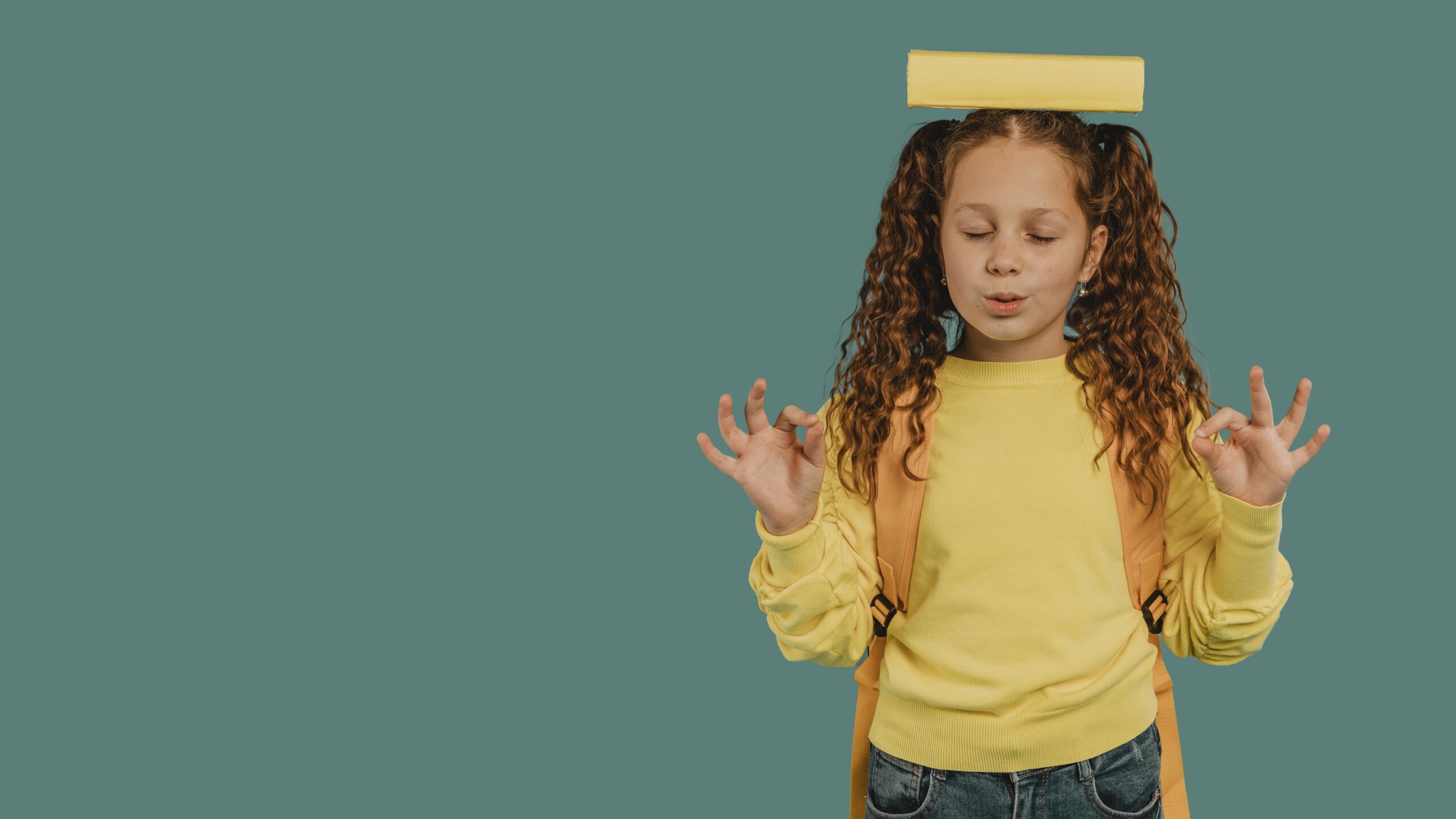 https://www.behavior123.com/wp-content/uploads/2024/04/school-girl-with-yellow-shirt-holding-book-head-copy-space-scaled.jpg